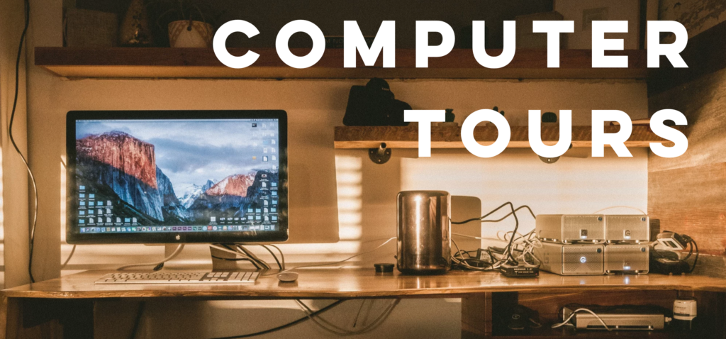 Text reading "Computer Tours" over a color photograph of a desktop computer at golden hour.